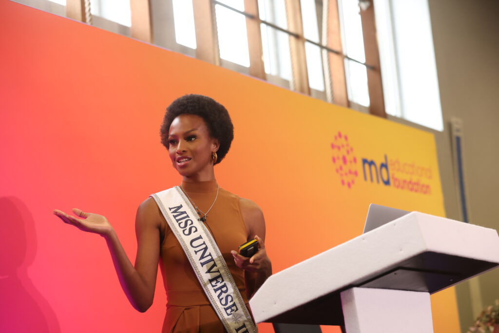 Aishah Akorede - the Founder of Recrowned Ireland & Miss Universe Ireland 2023, as a keynote speaker at mdeducational foundation's Ireland launch event